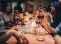 Photo by Helena Lopes: https://www.pexels.com/photo/people-drinking-liquor-and-talking-on-dining-table-close-up-photo-696218/