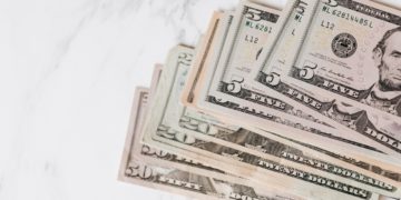 Photo by Karolina Grabowska: https://www.pexels.com/photo/different-dollar-bills-on-marble-surface-4386465/