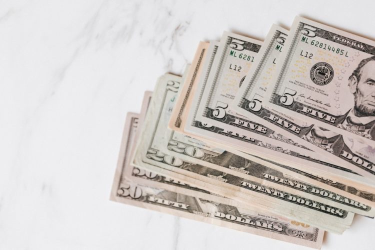 Photo by Karolina Grabowska: https://www.pexels.com/photo/different-dollar-bills-on-marble-surface-4386465/