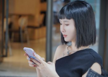 Photo by Zhengdong Hu: https://www.pexels.com/photo/young-woman-using-mobile-phone-16367558/