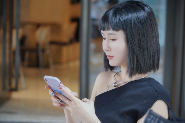 Photo by Zhengdong Hu: https://www.pexels.com/photo/young-woman-using-mobile-phone-16367558/