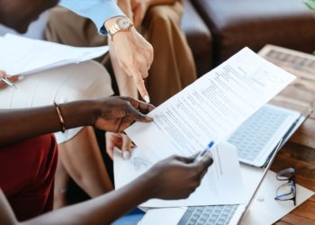 Photo by Alexander Suhorucov: https://www.pexels.com/photo/multiethnic-businesswomen-checking-information-in-documents-6457521/