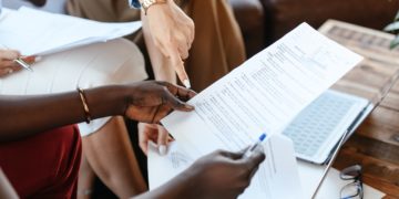Photo by Alexander Suhorucov: https://www.pexels.com/photo/multiethnic-businesswomen-checking-information-in-documents-6457521/
