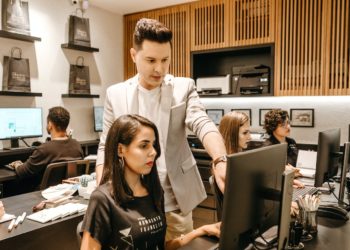 Photo by Jonathan Borba: https://www.pexels.com/photo/man-teaching-woman-in-front-of-monitor-3285203/