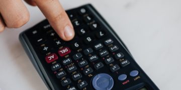 Photo by Karolina Grabowska: https://www.pexels.com/photo/crop-unrecognizable-financier-using-calculator-while-counting-income-at-work-4386328/