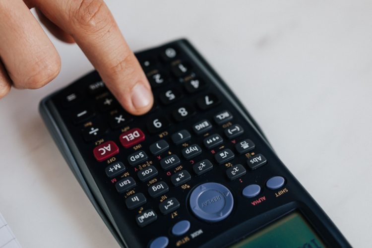 Photo by Karolina Grabowska: https://www.pexels.com/photo/crop-unrecognizable-financier-using-calculator-while-counting-income-at-work-4386328/