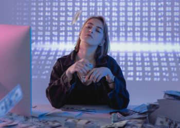Photo by Tima Miroshnichenko: https://www.pexels.com/photo/a-confident-woman-holding-bundles-of-cash-money-6266641/