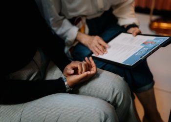 Photo by cottonbro studio: https://www.pexels.com/photo/person-in-white-long-sleeve-shirt-holding-a-clipboard-with-resume-5989933/
