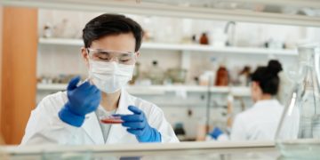 Photo by Edward Jenner: https://www.pexels.com/photo/man-doing-a-sample-test-in-the-laboratory-4033148/