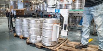 Photo by ELEVATE: https://www.pexels.com/photo/man-operating-silver-machine-for-silver-steel-kegs-1267332/