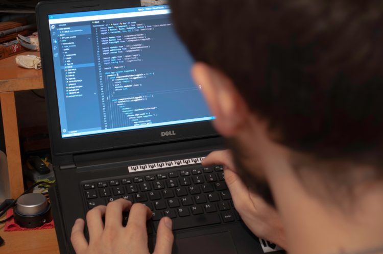 Photo by Jules Amé: https://www.pexels.com/photo/person-using-black-dell-laptop-computer-4078342/