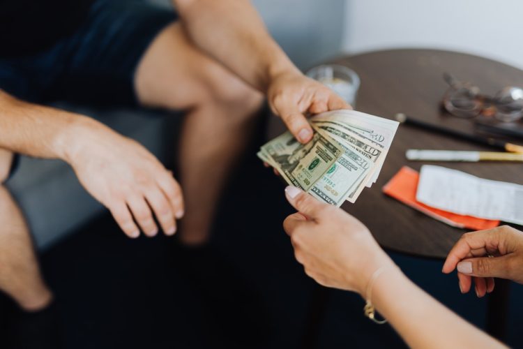 Photo by Karolina Grabowska: https://www.pexels.com/photo/person-giving-money-to-another-person-4968548/