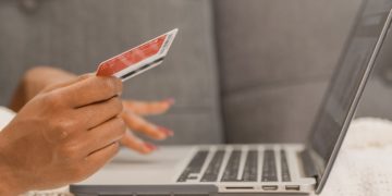 Photo by Kindel Media: https://www.pexels.com/photo/person-holding-credit-card-doing-online-shopping-6995252/