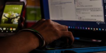 Photo by samer daboul: https://www.pexels.com/photo/person-holding-laptop-computer-1240532/