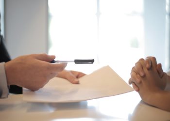 Photo by Andrea Piacquadio: https://www.pexels.com/photo/crop-businessman-giving-contract-to-woman-to-sign-3760067/