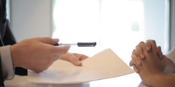 Photo by Andrea Piacquadio: https://www.pexels.com/photo/crop-businessman-giving-contract-to-woman-to-sign-3760067/