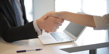 Photo by Andrea Piacquadio: https://www.pexels.com/photo/person-in-black-suit-hired-an-employee-3760069/