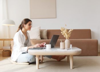 Photo by Artem Podrez: https://www.pexels.com/photo/content-woman-using-laptop-on-floor-4492129/