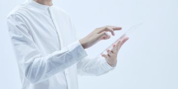 Photo by Michelangelo Buonarroti: https://www.pexels.com/photo/a-person-in-white-long-sleeves-holding-a-clear-glass-8728168/