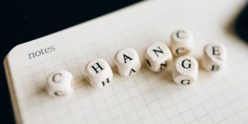 Photo by Nataliya Vaitkevich: https://www.pexels.com/photo/a-close-up-shot-of-letter-dice-on-an-open-notebook-6120220/