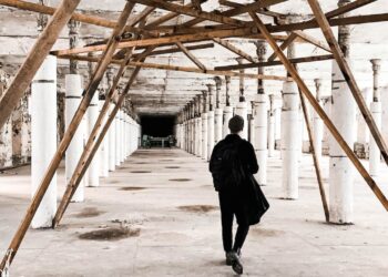 Photo by Marlene Leppänen: https://www.pexels.com/photo/unrecognizable-man-walking-in-building-corridor-under-reconstruction-5305811/