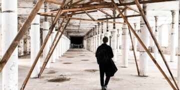 Photo by Marlene Leppänen: https://www.pexels.com/photo/unrecognizable-man-walking-in-building-corridor-under-reconstruction-5305811/