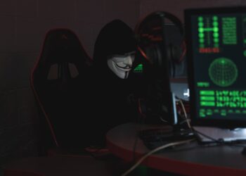 Photo by Tima Miroshnichenko: https://www.pexels.com/photo/person-wearing-a-mask-sitting-on-chair-while-using-a-computer-5380605/