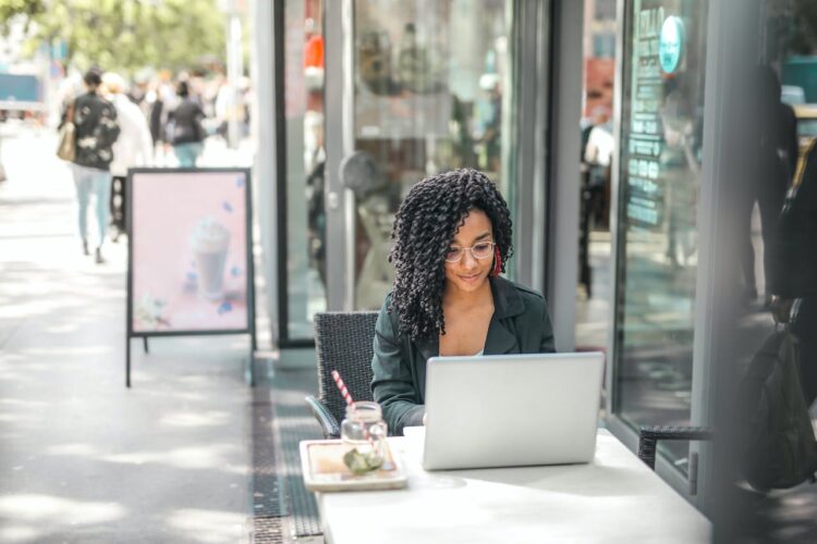 Photo by Andrea Piacquadio: https://www.pexels.com/photo/ethnic-young-woman-using-laptop-while-having-tasty-beverage-in-modern-street-cafe-3768894/