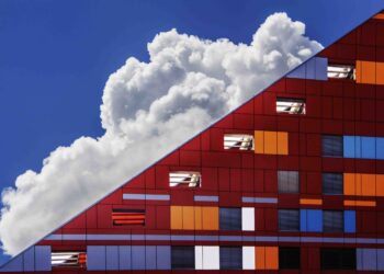 Photo by Ivan Cujic: https://www.pexels.com/photo/cloud-in-sky-and-building-109479/