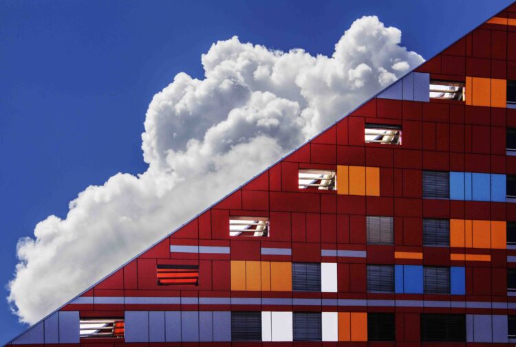 Photo by Ivan Cujic: https://www.pexels.com/photo/cloud-in-sky-and-building-109479/