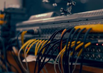 Photo by Jah Nomad: https://www.pexels.com/photo/a-close-up-of-a-computer-with-wires-and-cables-17220238/