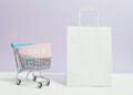 Photo by Karolina Grabowska: https://www.pexels.com/photo/sale-sign-in-a-miniature-shopping-cart-and-paper-bag-5632398/