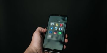 Photo by Magnus Mueller: https://www.pexels.com/photo/photo-of-hand-holding-a-black-smartphone-2818118/