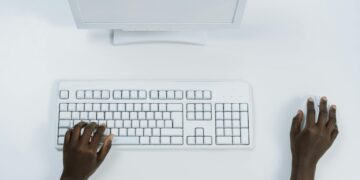 Photo by cottonbro studio: https://www.pexels.com/photo/person-using-a-white-computer-set-5185153/