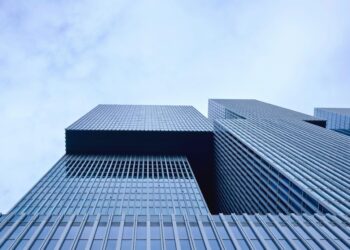 Photo by Matthias Zomer: https://www.pexels.com/photo/low-angle-view-of-office-building-against-sky-313736/