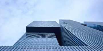 Photo by Matthias Zomer: https://www.pexels.com/photo/low-angle-view-of-office-building-against-sky-313736/