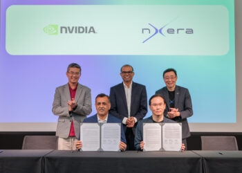 MOU signing on supporting national and regional AI development. (Back row, from left to right): Mr Lew Chuen Hong, Chief Executive Officer of the Infocomm Media Development Authority (IMDA); Dr Janil Puthucheary, Senior Minister of State, Ministry of Communications and Information; Mr Bill Chang, CEO of Nxera and Singtel's Digital InfraCo unit. (Front row, from left to right): Mr Ronnie Vasishta, SVP Telecom, NVIDIA; Mr Lee Yoong Kin, Vice President of Products & Platform, Nxera.