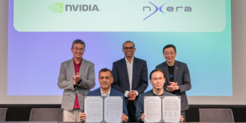 MOU signing on supporting national and regional AI development. (Back row, from left to right): Mr Lew Chuen Hong, Chief Executive Officer of the Infocomm Media Development Authority (IMDA); Dr Janil Puthucheary, Senior Minister of State, Ministry of Communications and Information; Mr Bill Chang, CEO of Nxera and Singtel's Digital InfraCo unit. (Front row, from left to right): Mr Ronnie Vasishta, SVP Telecom, NVIDIA; Mr Lee Yoong Kin, Vice President of Products & Platform, Nxera.