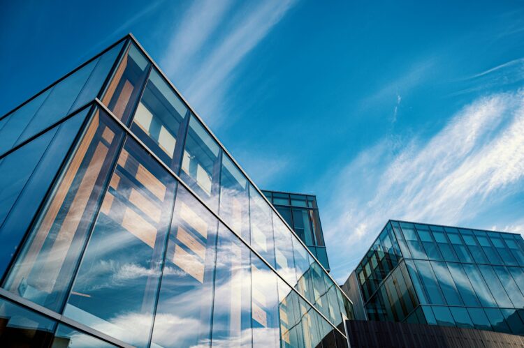 Photo by Brett Sayles: https://www.pexels.com/photo/low-angle-photo-of-glass-buildings-2599538/