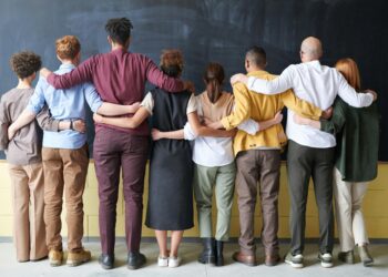 Photo by fauxels: https://www.pexels.com/photo/group-of-people-standing-indoors-3184396/