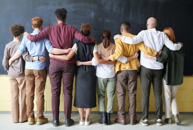 Photo by fauxels: https://www.pexels.com/photo/group-of-people-standing-indoors-3184396/