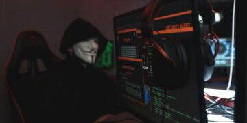Photo by Tima Miroshnichenko: https://www.pexels.com/photo/person-in-black-hoodie-hacking-a-computer-system-5380651/