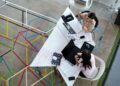 Photo by Visual Tag Mx: https://www.pexels.com/photo/two-women-sitting-in-chairs-using-laptop-computers-2566573/