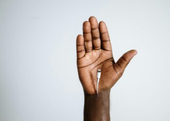 Photo by cottonbro studio: https://www.pexels.com/photo/person-with-silver-ring-with-white-cigarette-stick-4631062/