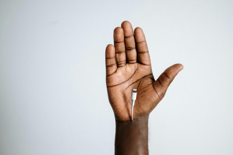 Photo by cottonbro studio: https://www.pexels.com/photo/person-with-silver-ring-with-white-cigarette-stick-4631062/