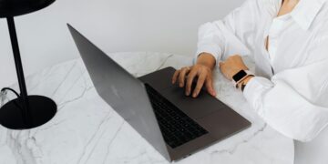 Photo by Karolina Grabowska: https://www.pexels.com/photo/high-angle-view-of-woman-using-laptop-4968723/