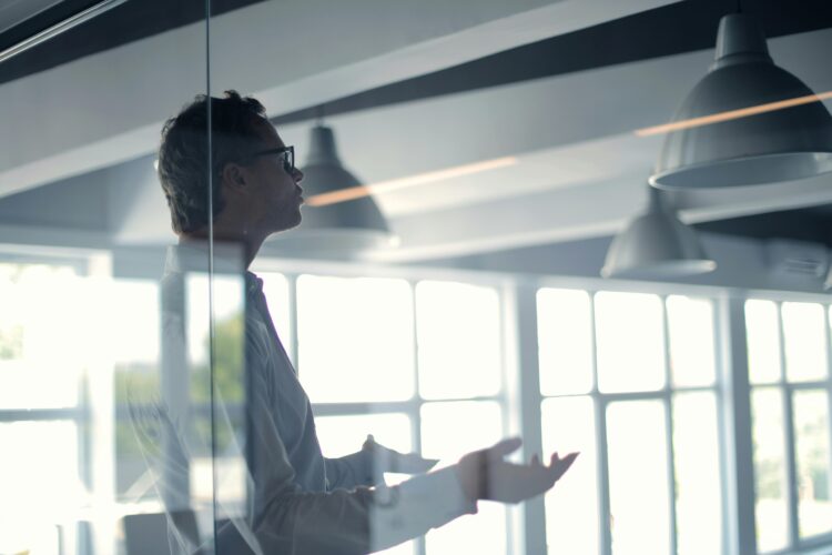 Photo by Andrea Piacquadio: https://www.pexels.com/photo/male-employer-gesticulating-and-explaining-idea-in-light-office-3760089/