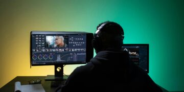 Photo by Ron Lach : https://www.pexels.com/photo/a-man-sitting-on-front-of-the-computer-while-editing-video-8102677/