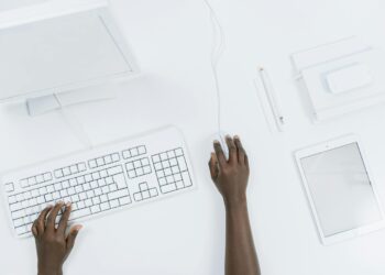 Photo by cottonbro studio: https://www.pexels.com/photo/person-using-a-white-computer-set-5185155/