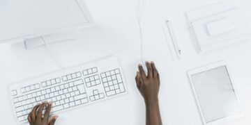 Photo by cottonbro studio: https://www.pexels.com/photo/person-using-a-white-computer-set-5185155/
